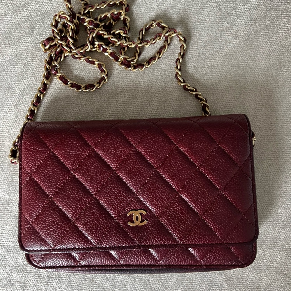 Burgundy Chanel quilted wallet on chain with gold hardware!